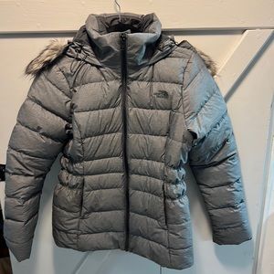 The North Face Jacket with hood. Size small. Gray